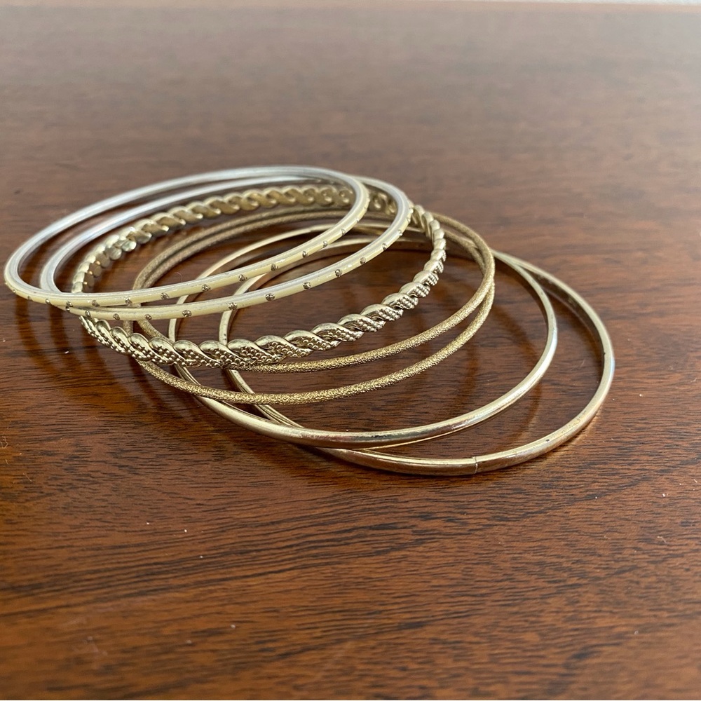 Set of Seven Elegant Gold Bangle Bracelets!